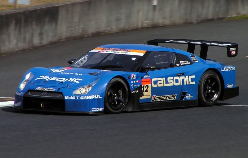 Blue Race Car — Dynamic, Afternoon, Photograph, Race Track, Tire, Wing