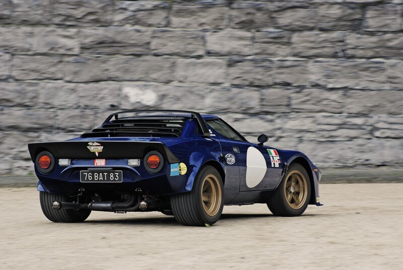 Blue Race Car — Dynamic, Afternoon, Photograph, Stone Wall