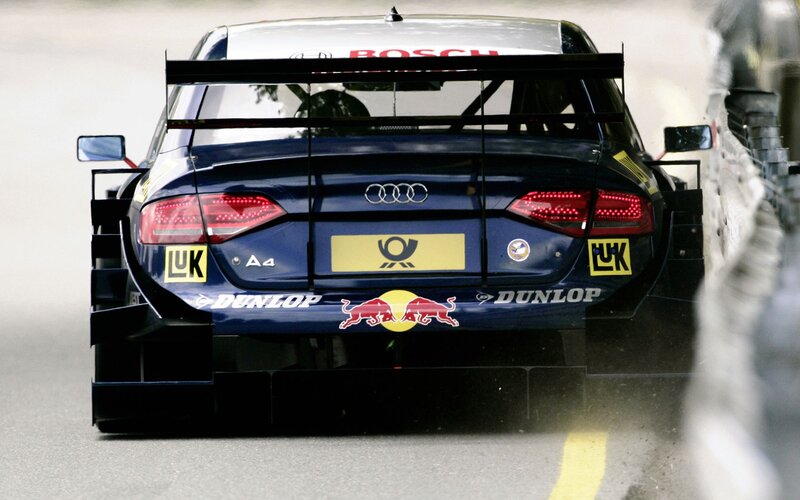 Blue Race Car — Dynamic, Photograph, Race Track, Tire Barrier, Rear Wing