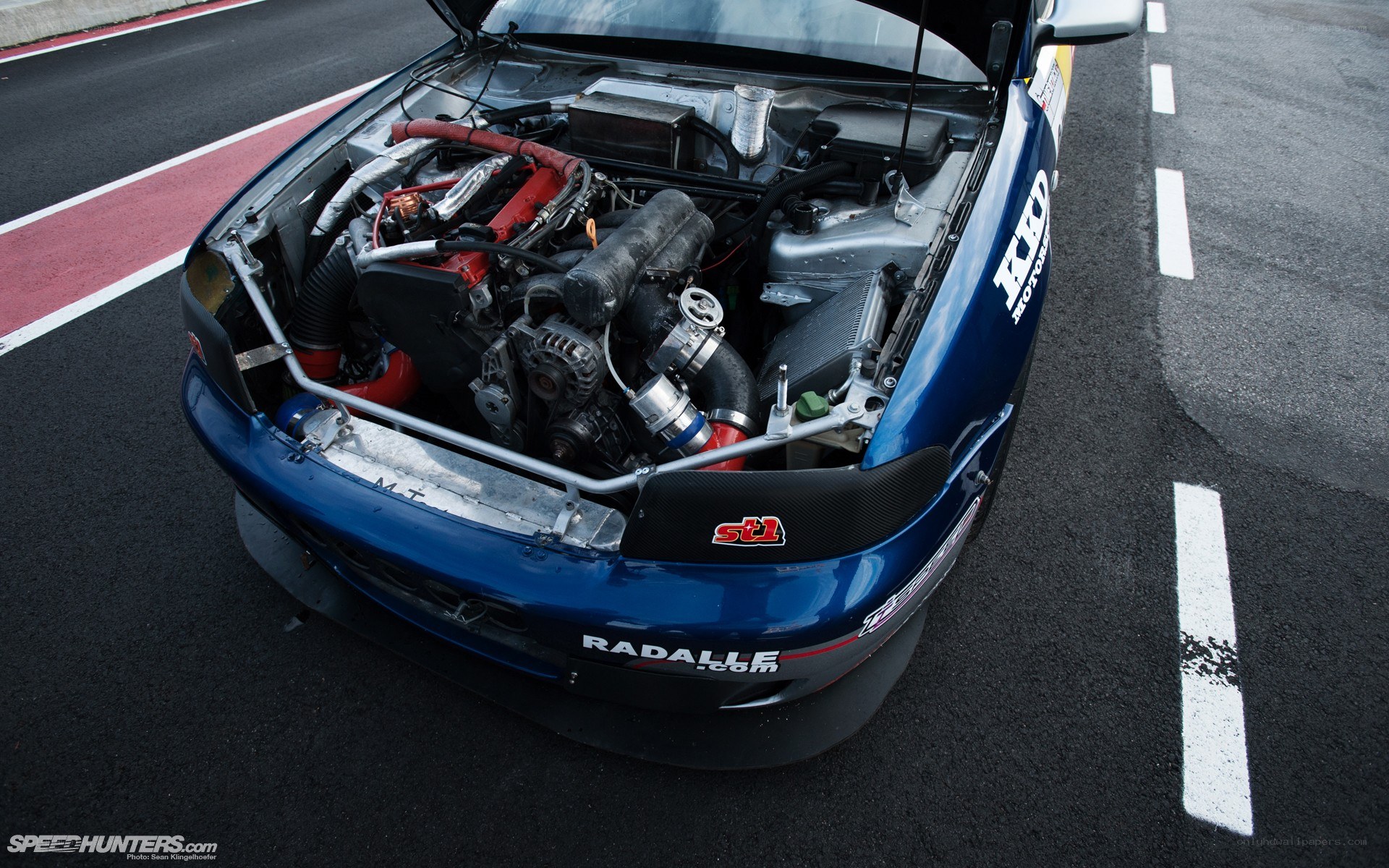 blue race car engine bay