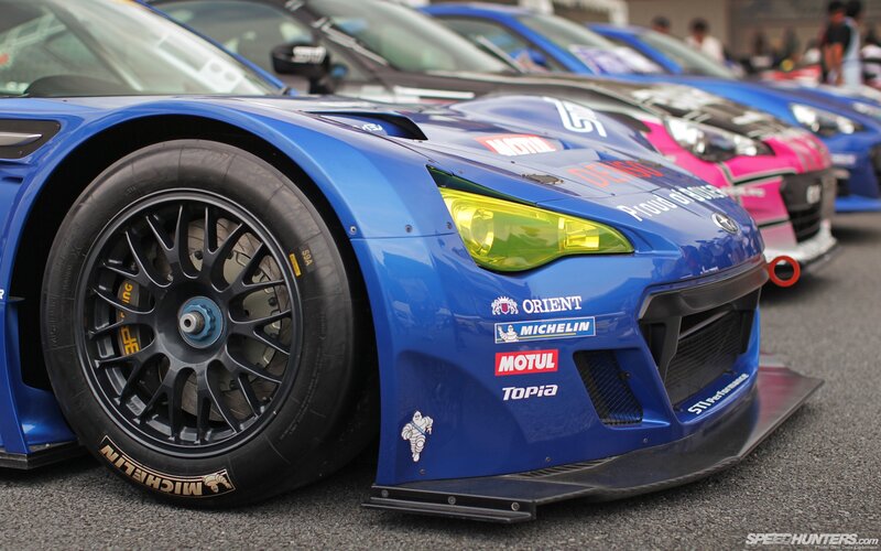 Blue race car in a lineup