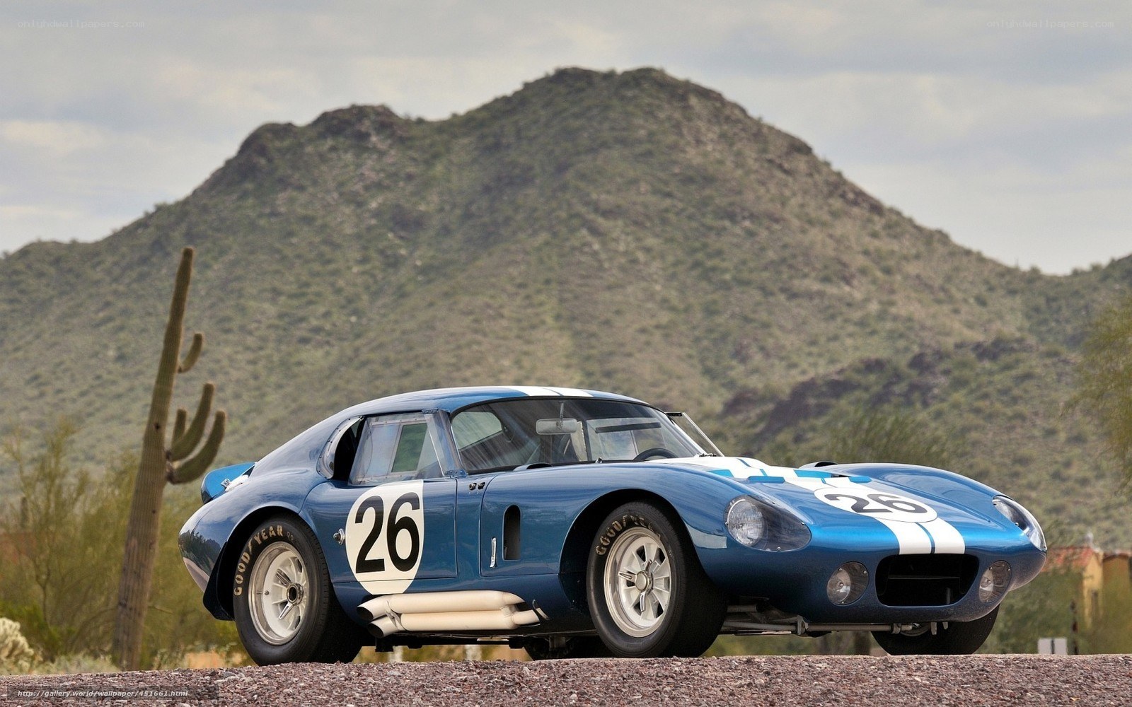 Blue race car in desert