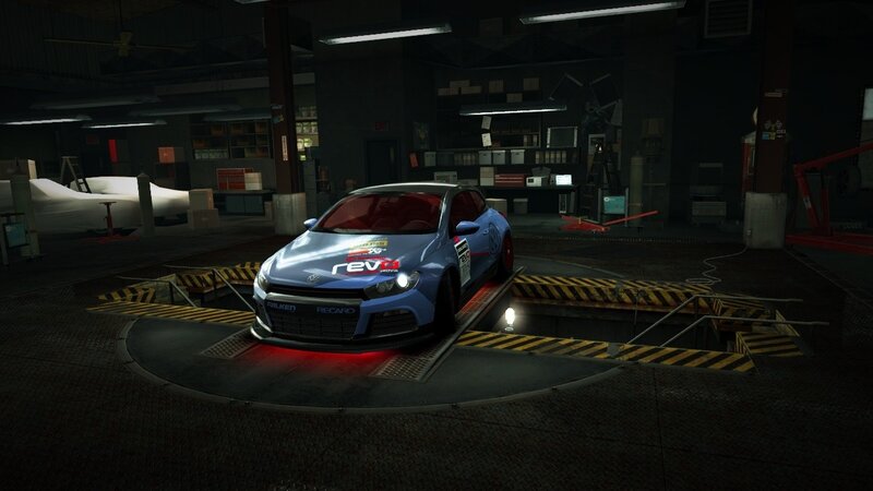 blue race car in garage