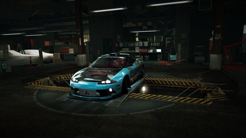 blue race car in garage
