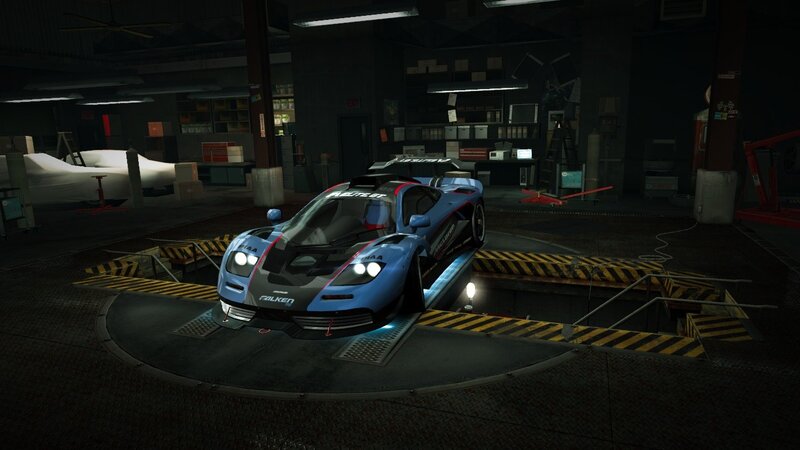 blue race car in garage