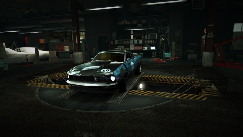 blue race car in garage
