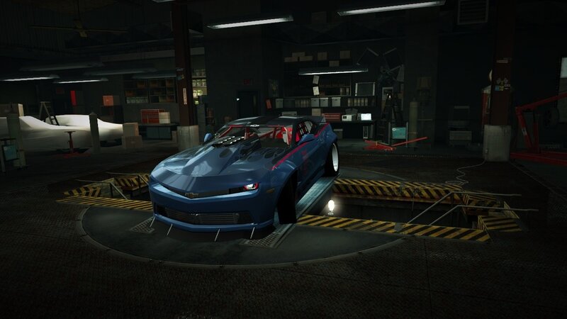 blue race car in garage