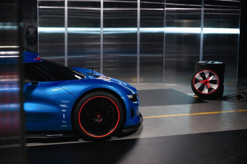 Blue race car in garage