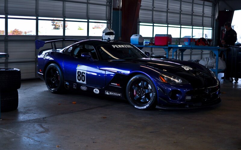Blue Race Car in Garage — Dramatic, Photograph
