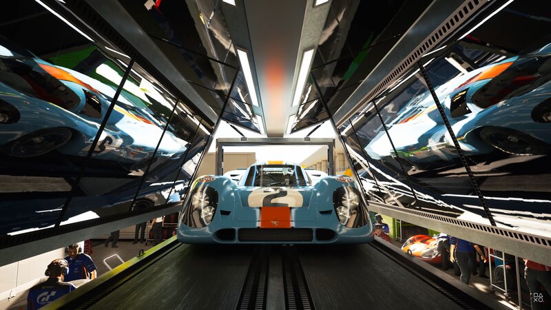Blue Race Car in Garage — Dramatic
