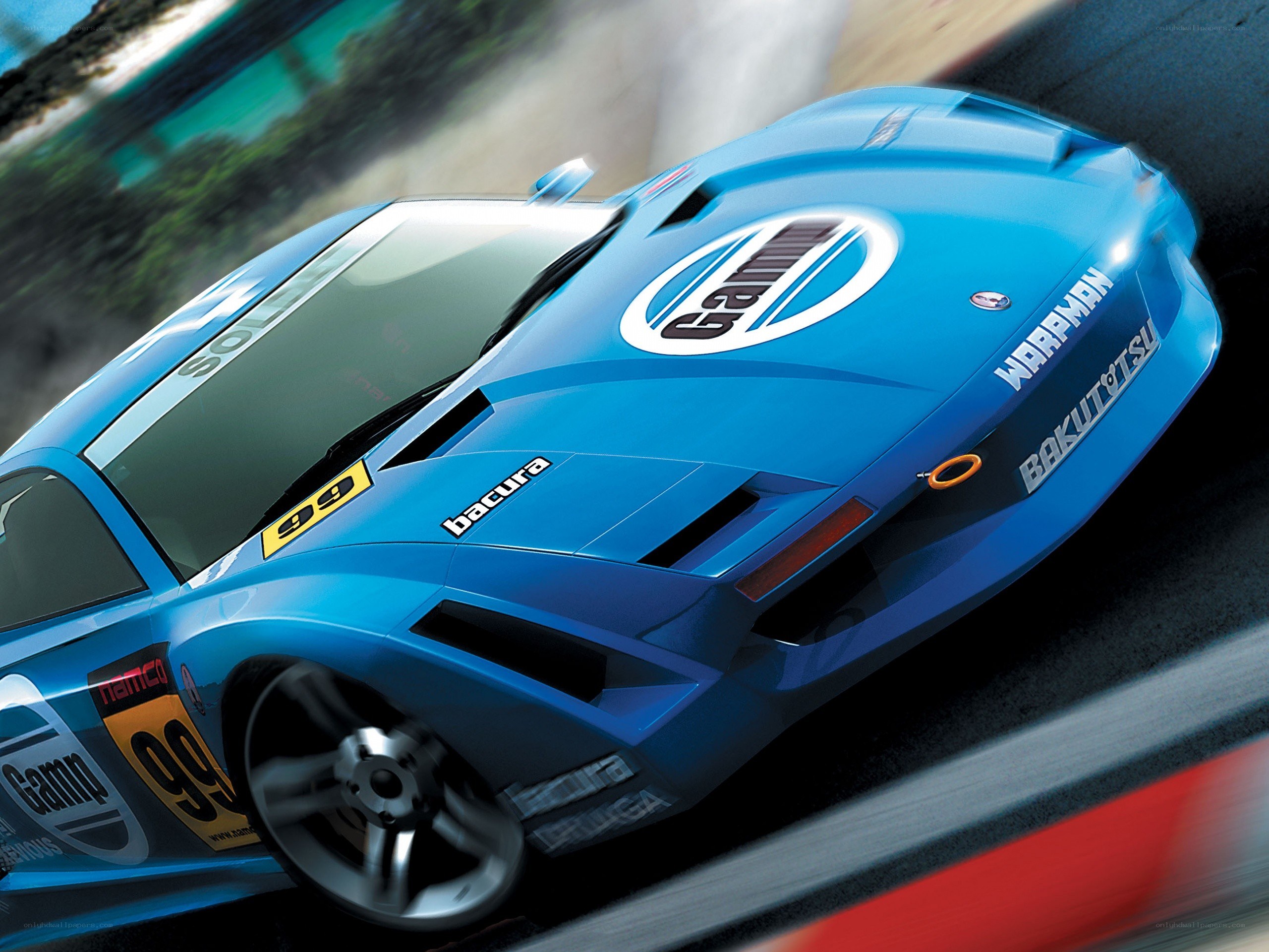 blue race car in motion