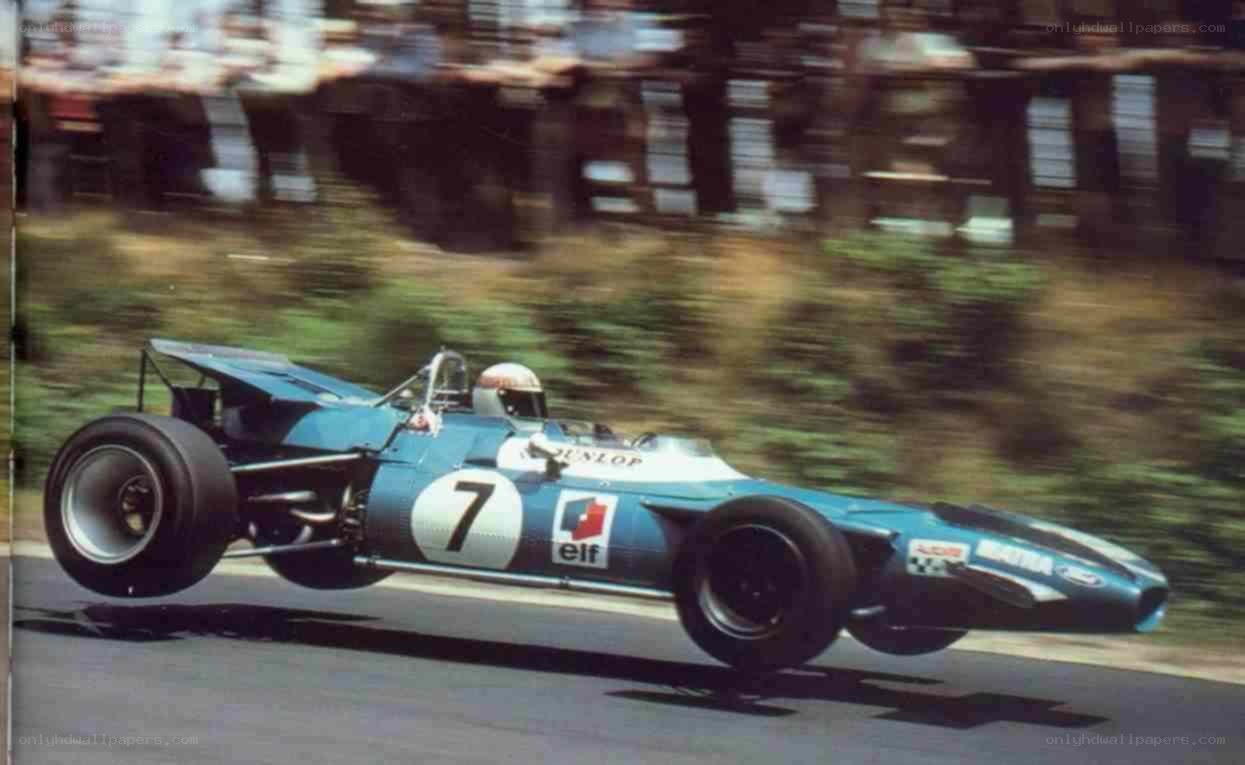 blue race car in motion