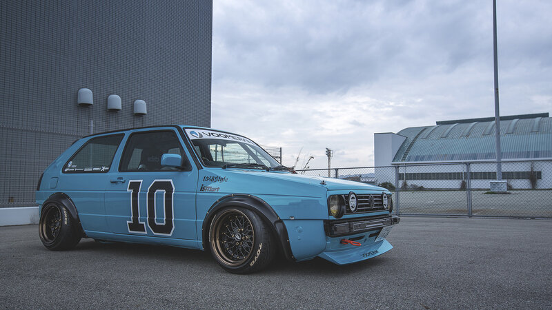 Blue Race Car — Light Blue, Dramatic, Afternoon