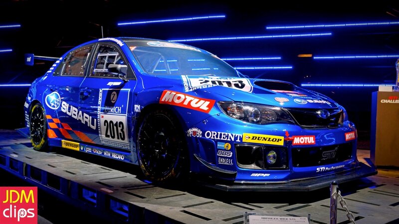 Blue Race Car on Display — Dramatic