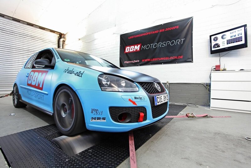 Blue race car on dynamometer