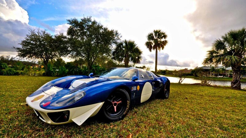 Blue Race Car on Grass — Serene