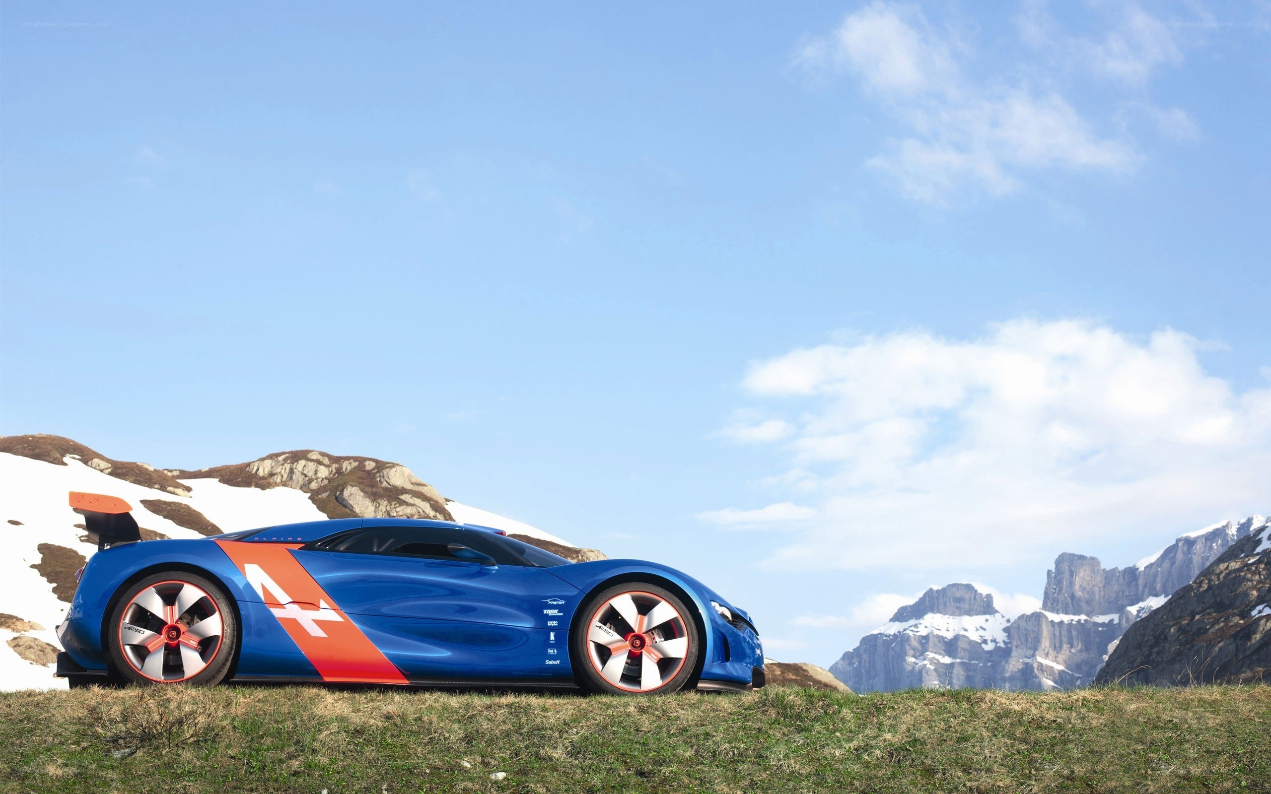 Blue race car on mountain