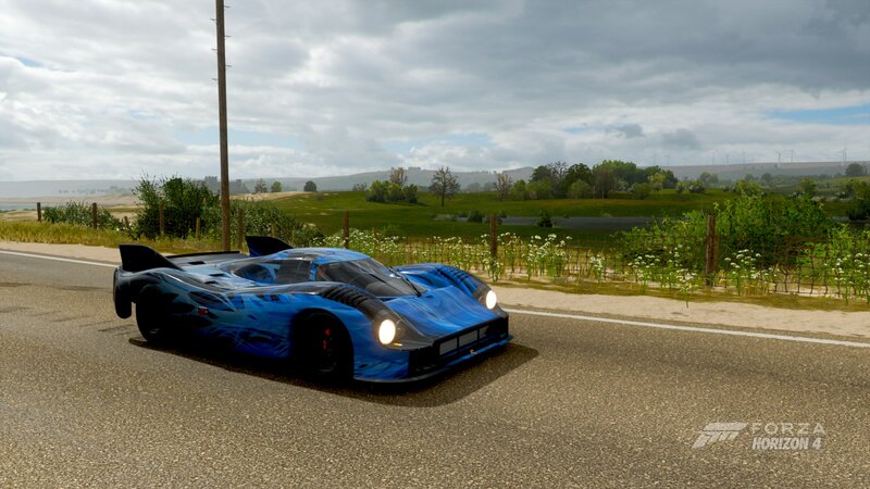 Blue Race Car on Road — Calm