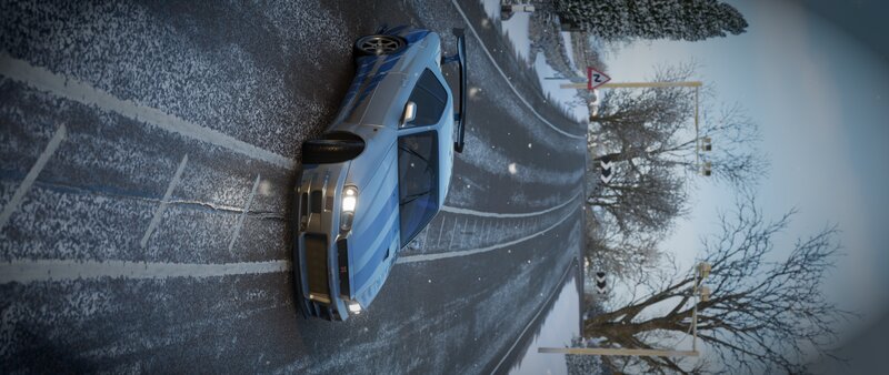 Blue Race Car on Road — Cold, Wintry