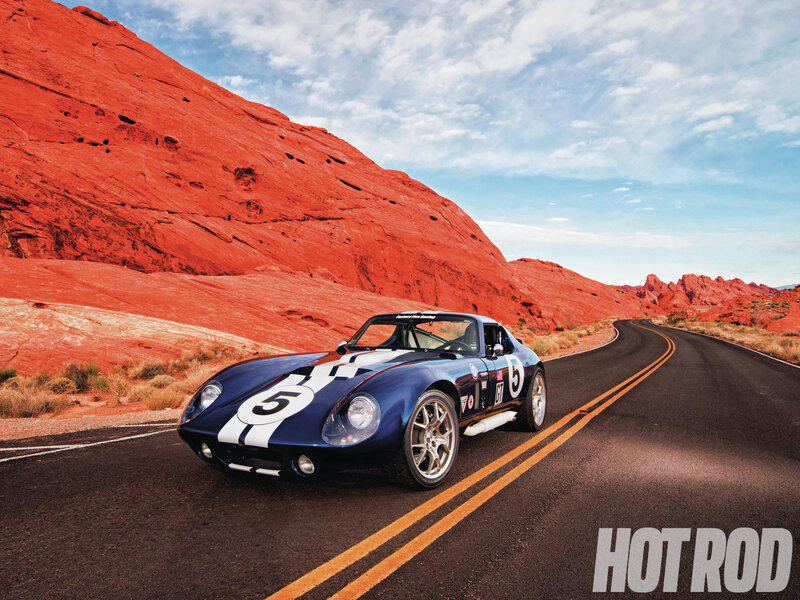 Blue Race Car on Road — Dramatic, Afternoon