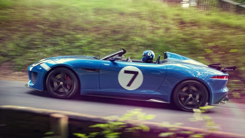 Blue Race Car on Road — Dynamic, Afternoon, Photograph