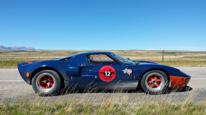 Blue Race Car on Road — Serene