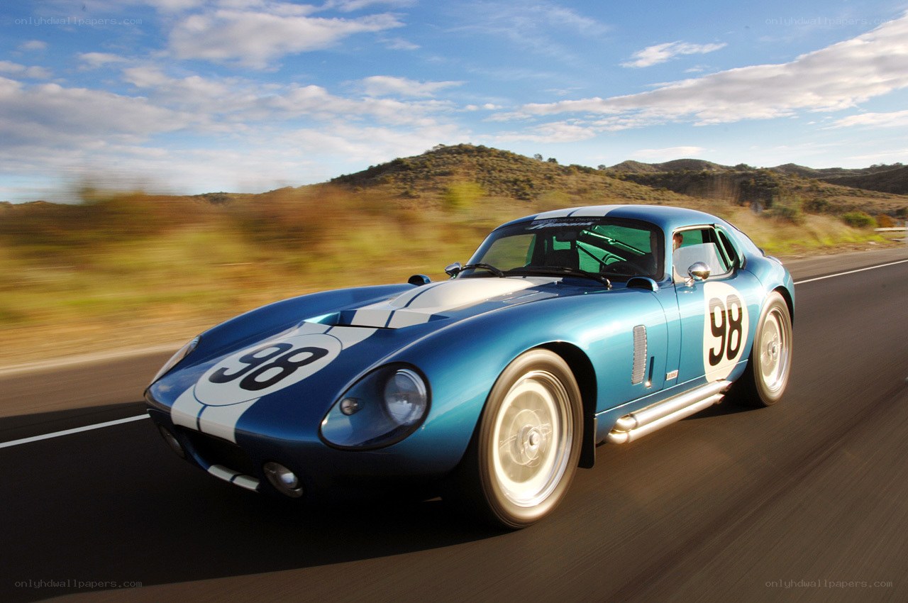 Blue race car on road