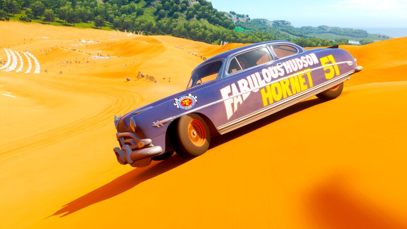 Blue Race Car on Sand