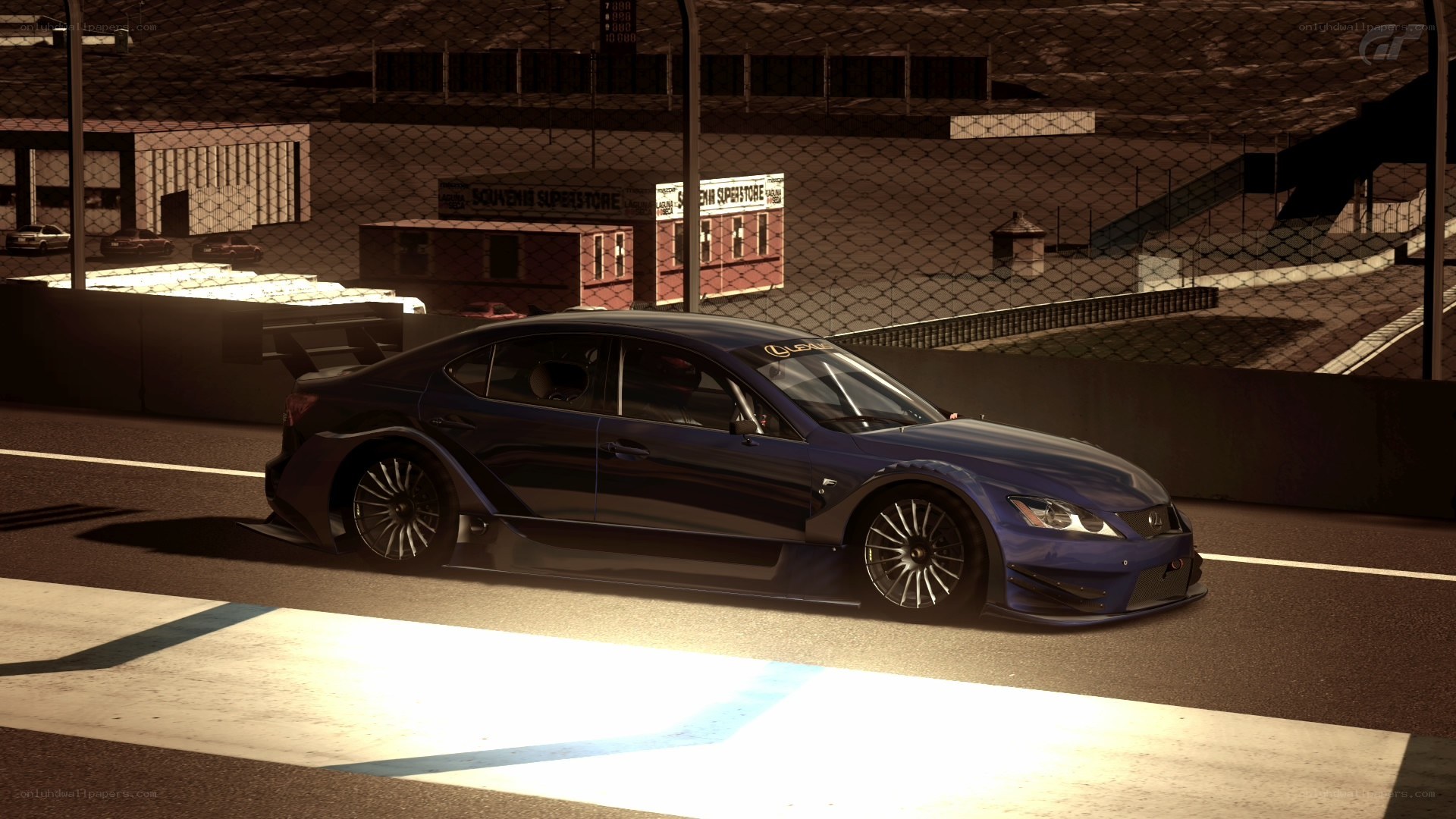 blue race car on track