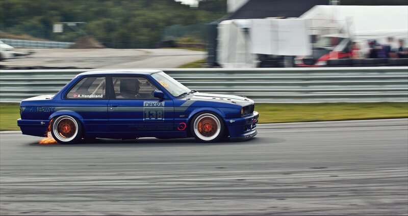 Blue race car on track