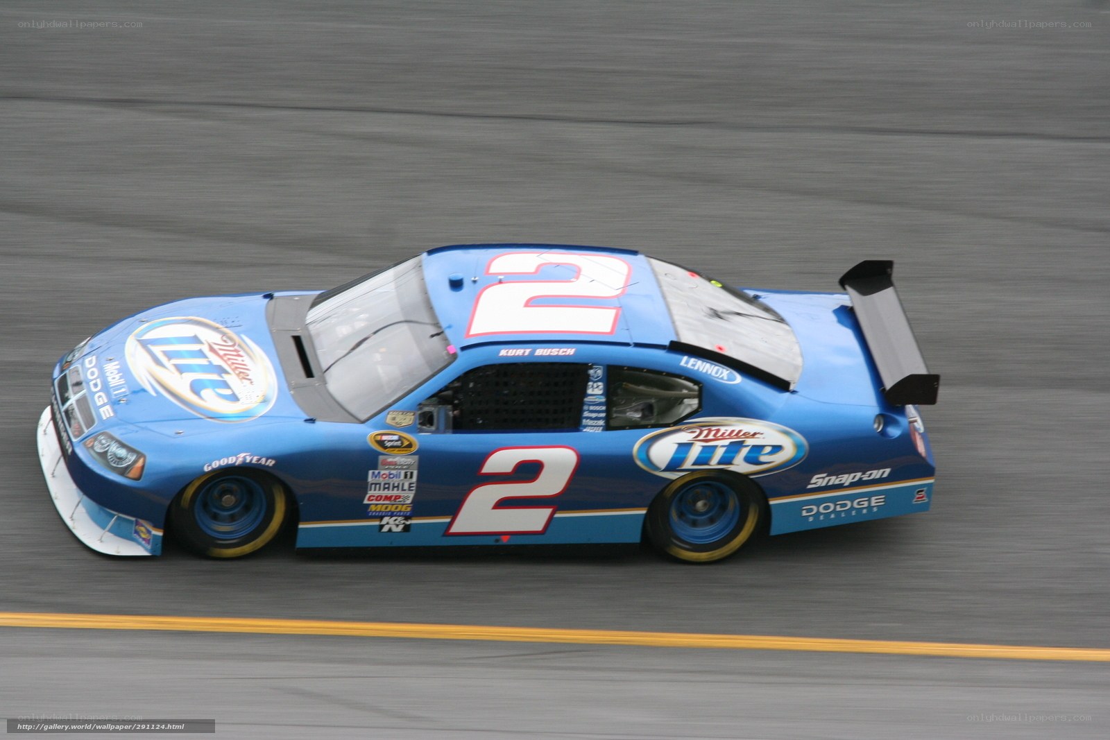 blue race car on track
