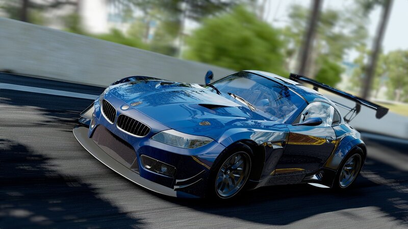 blue race car on track