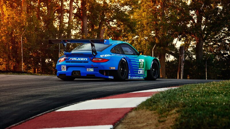 blue race car on track