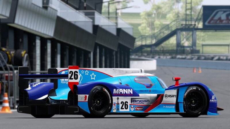 blue race car on track