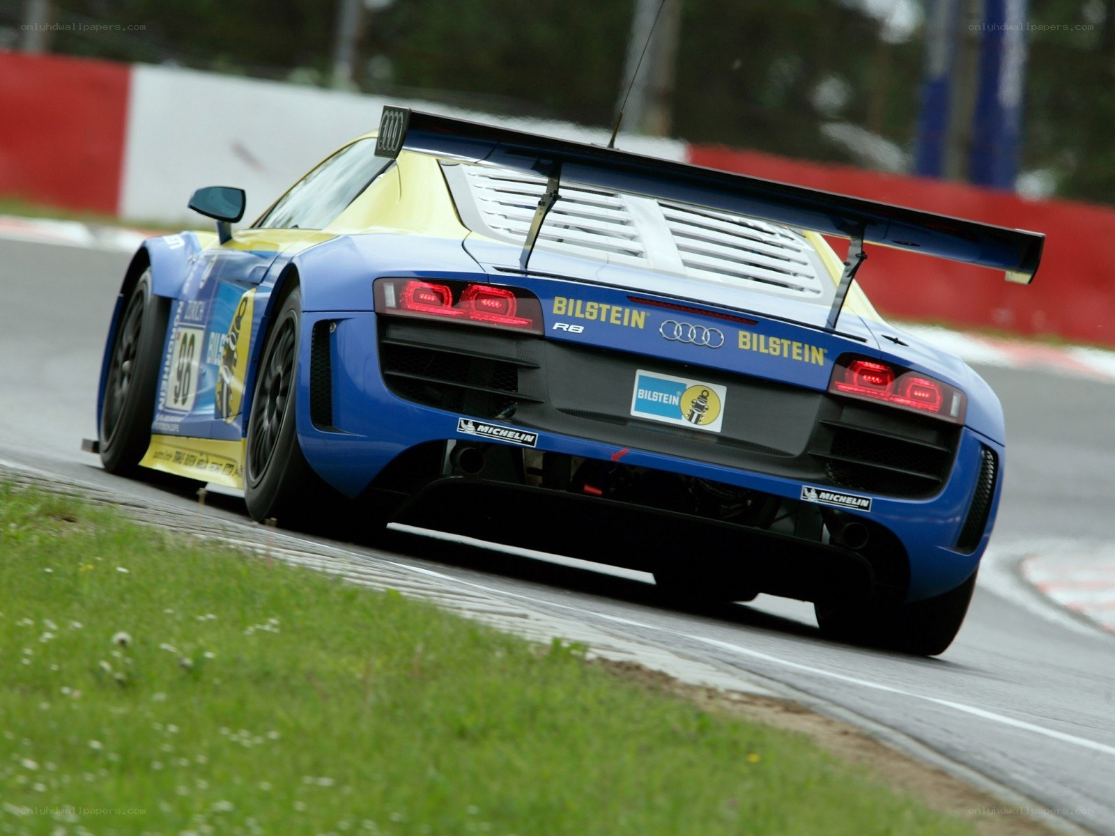 blue race car on track