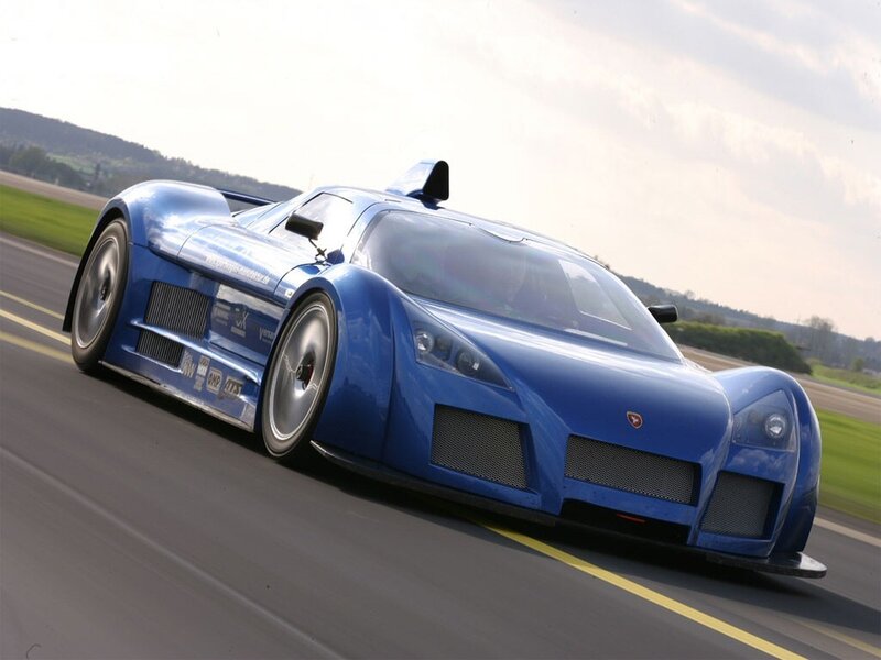 blue race car on track