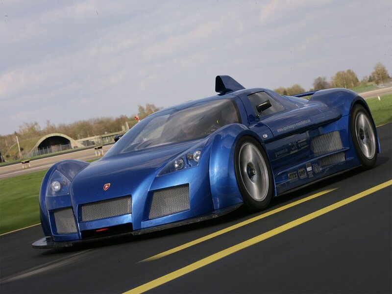 blue race car on track