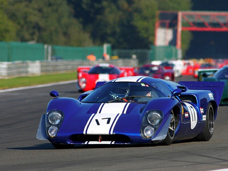 blue race car on track