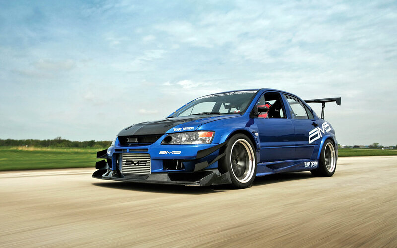 blue race car on track