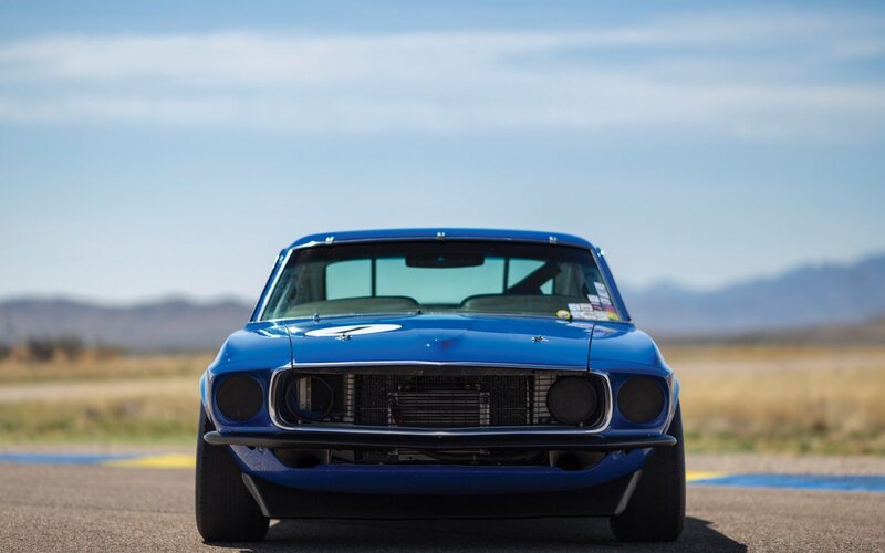 blue race car on track