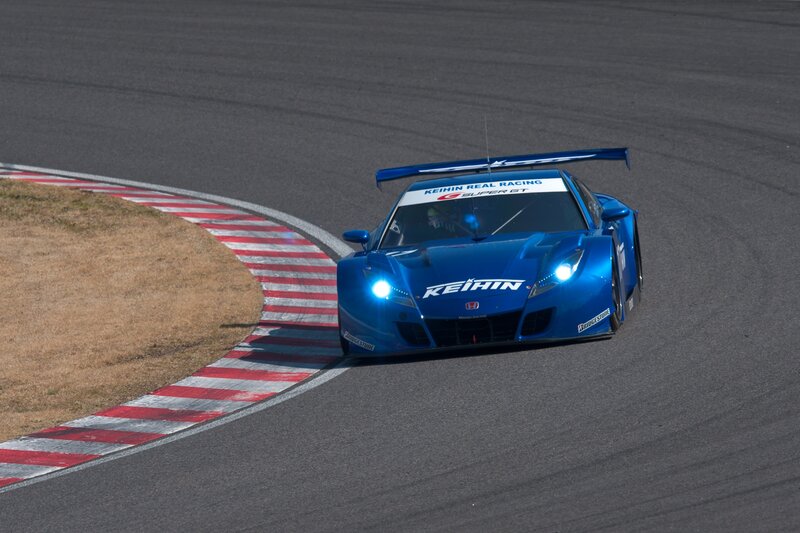 Blue race car on track