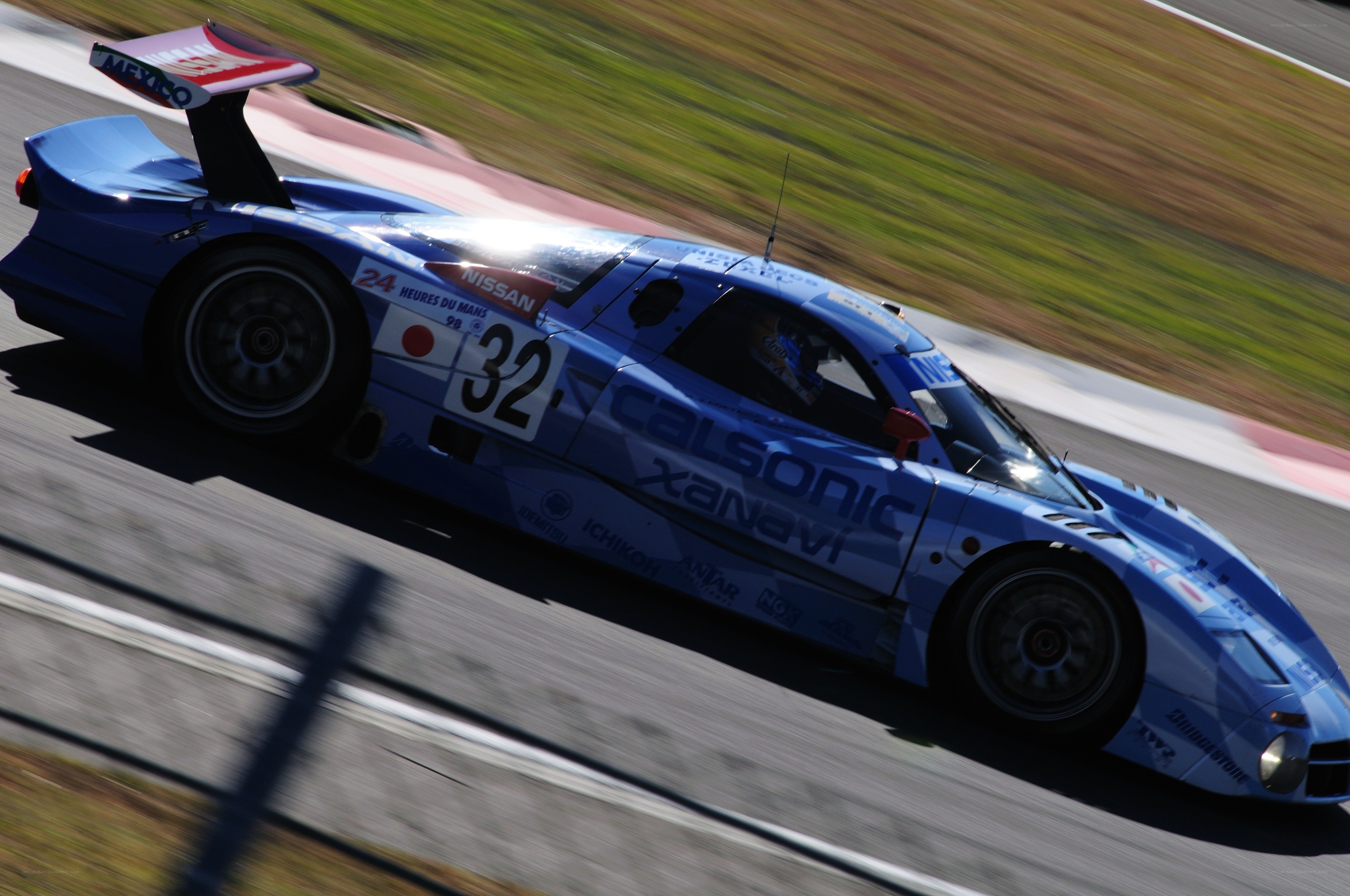 Blue race car on track