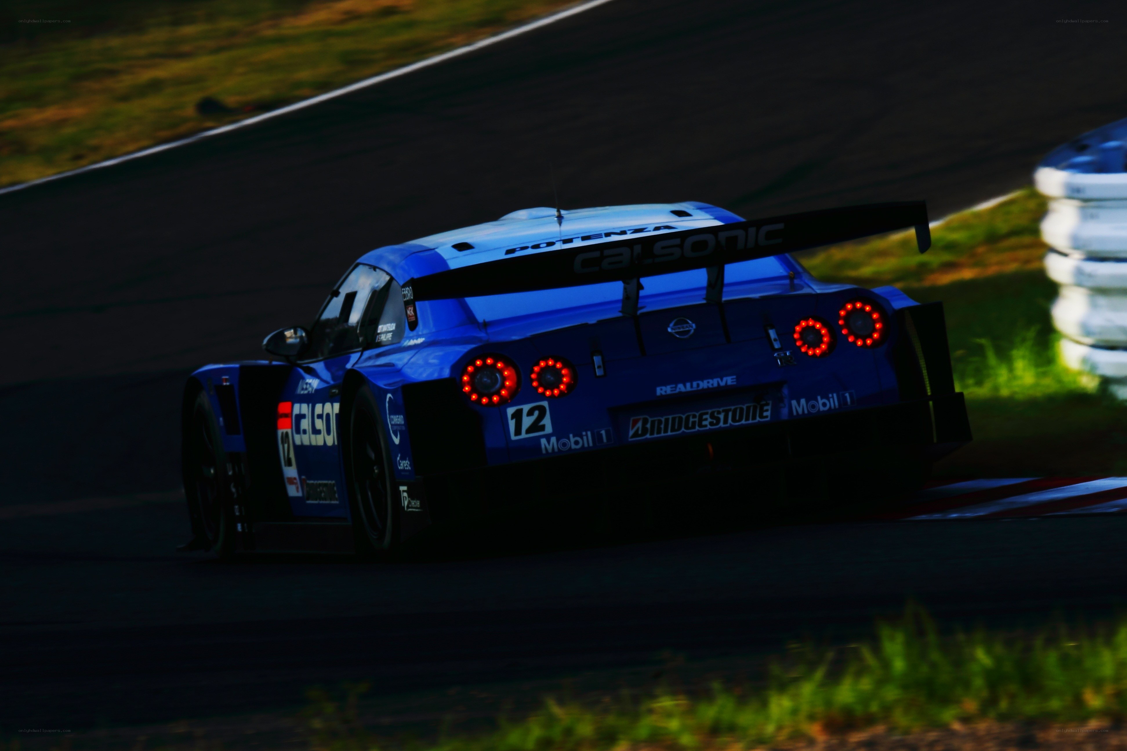 Blue race car on track