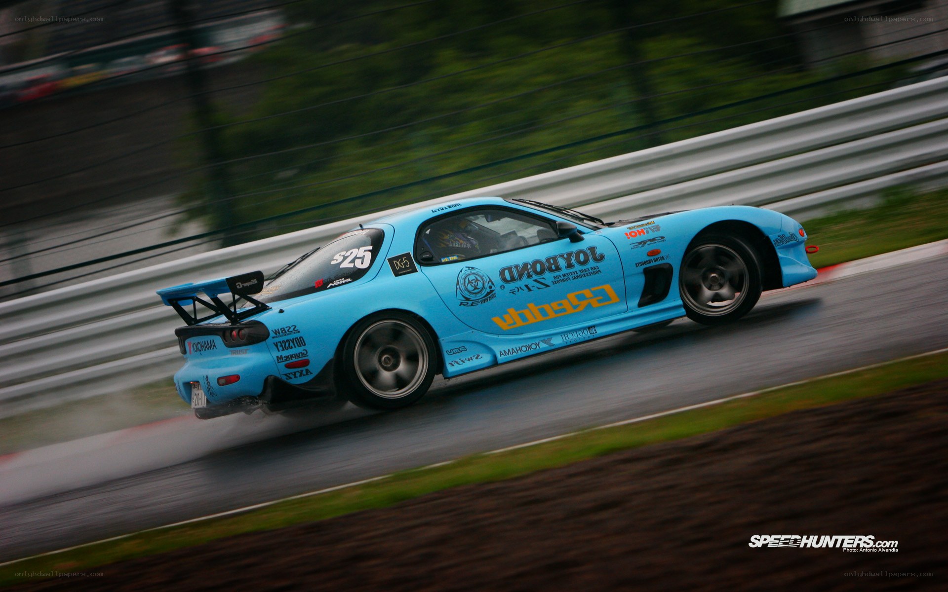 blue race car on track