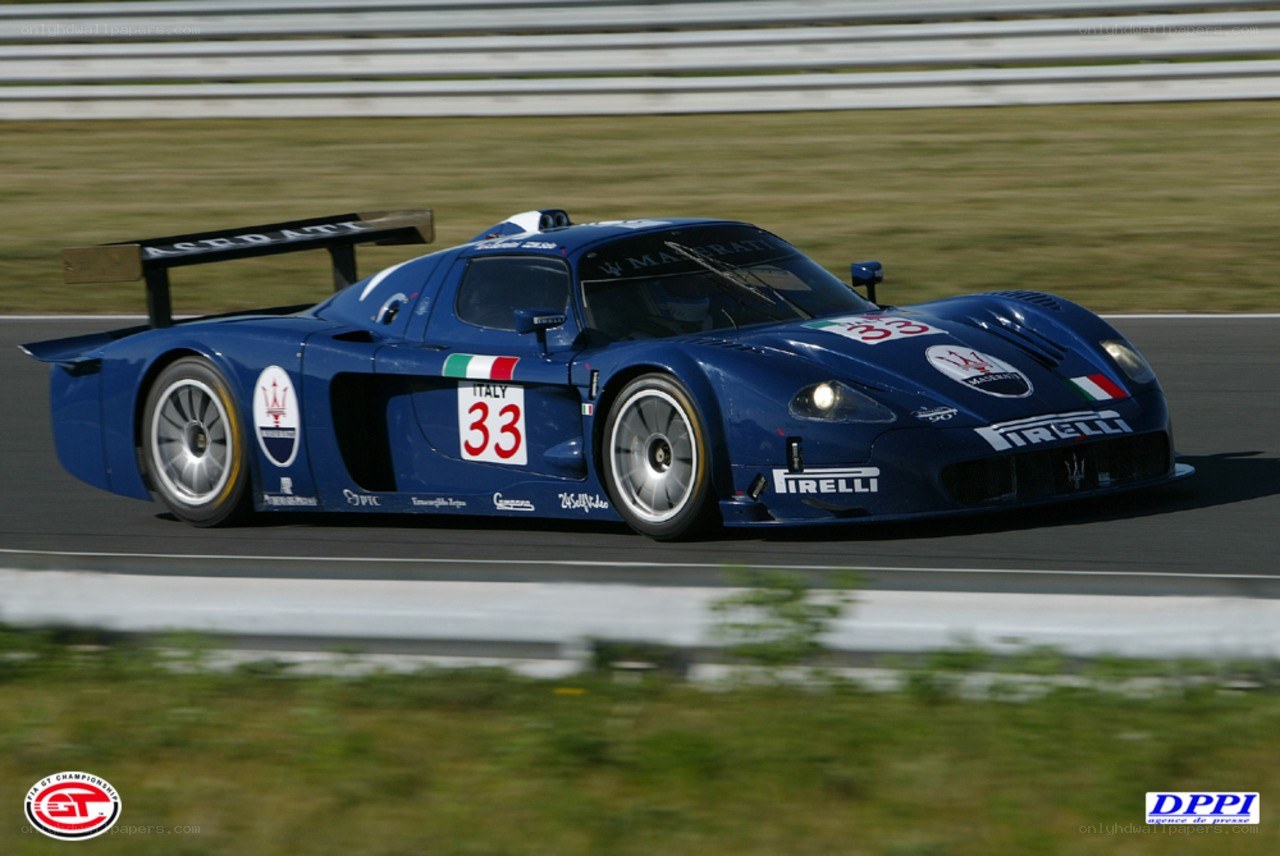 blue race car on track