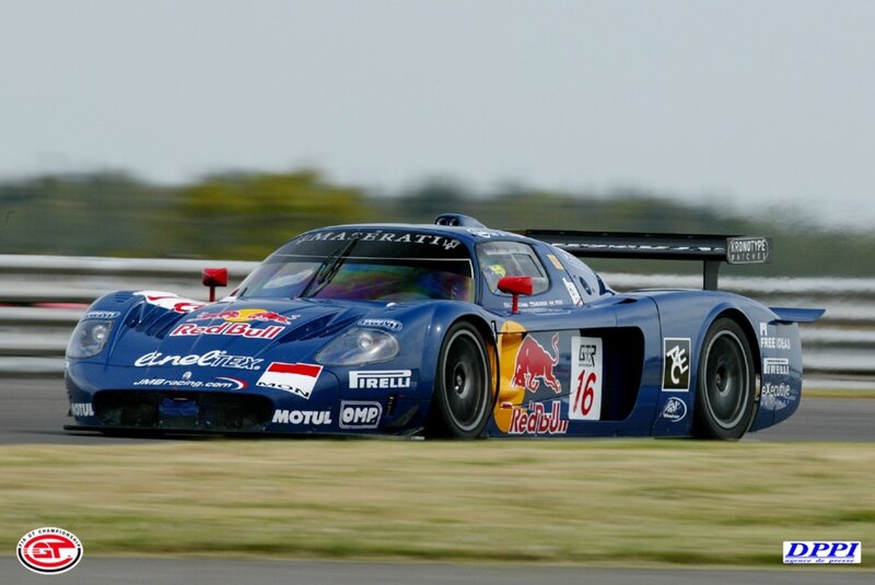blue race car on track