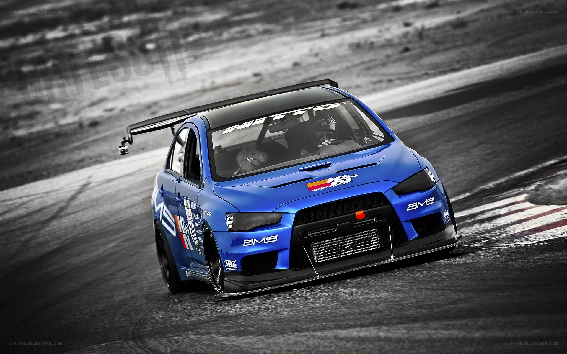 blue race car on track