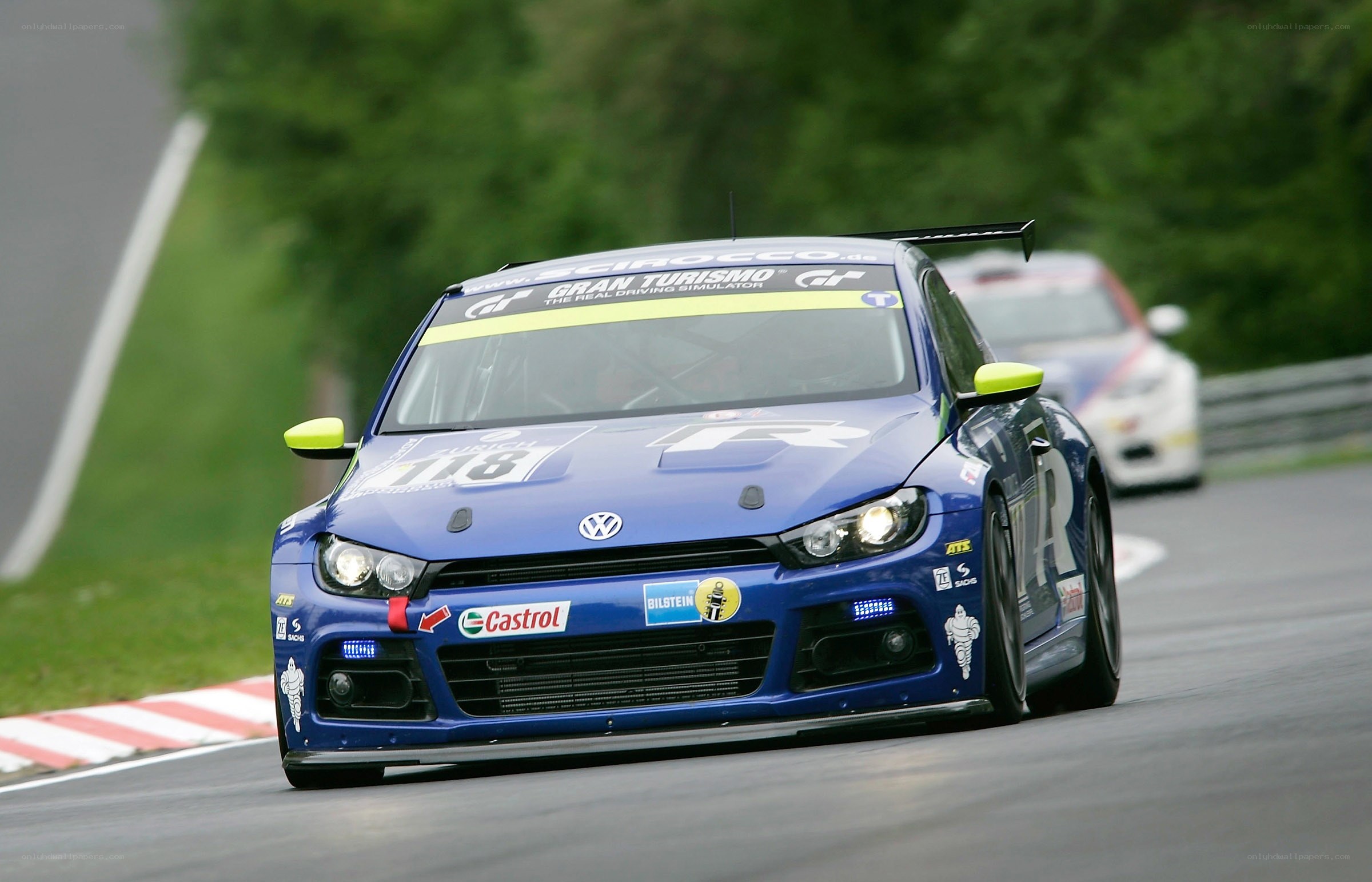 blue race car on track