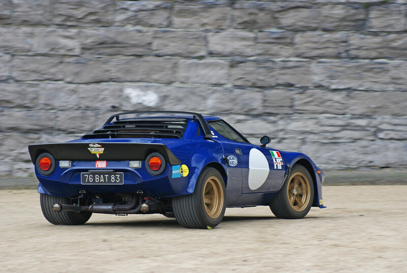 blue race car on track