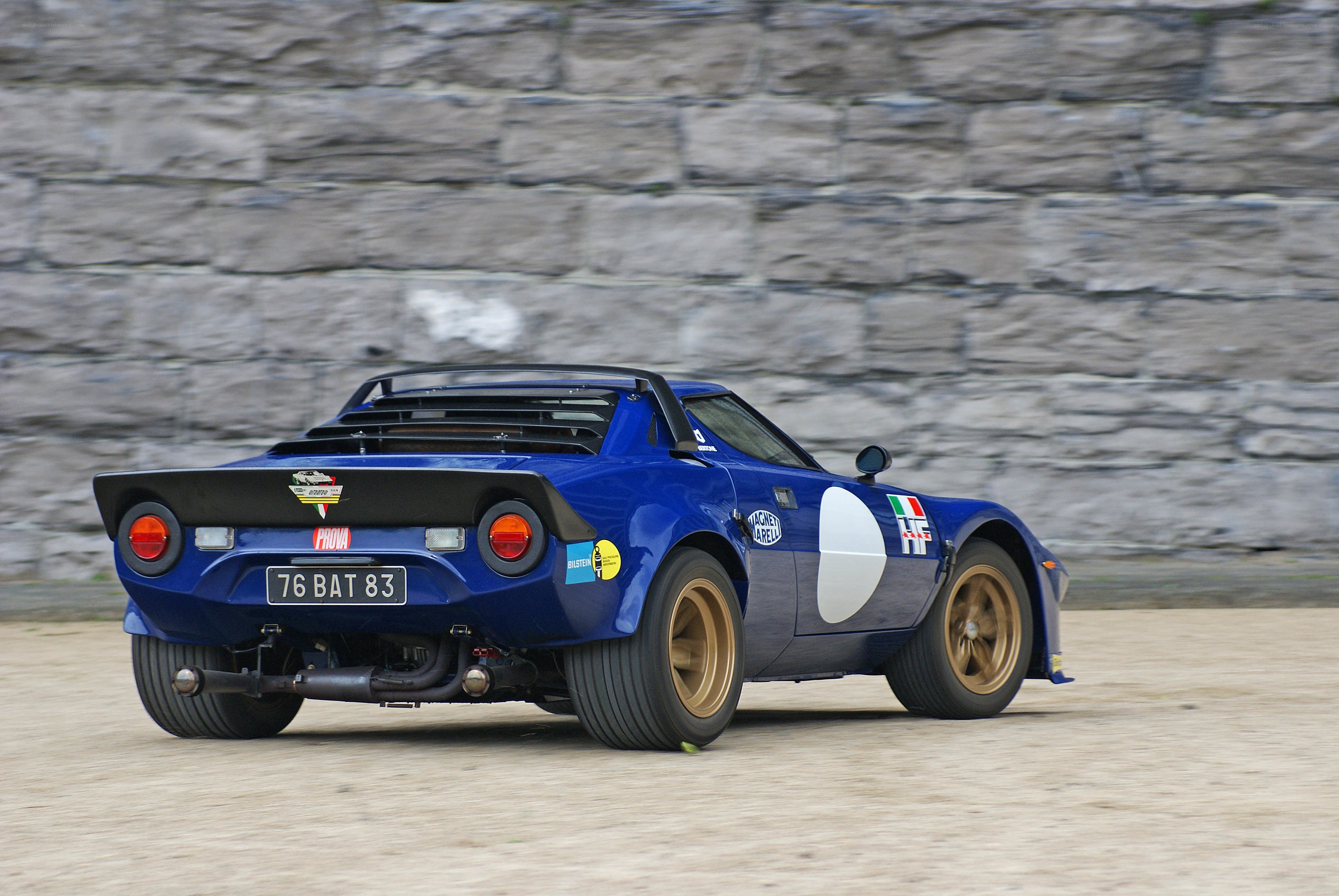 blue race car on track